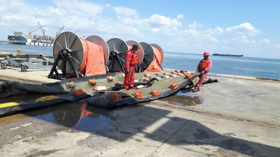 Engineering team conducting port inspection briefing